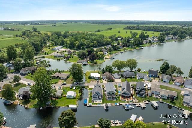 bird's eye view featuring a residential view and a water view