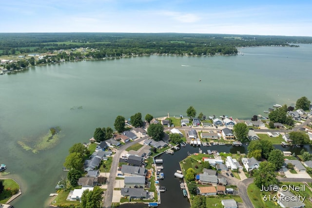 aerial view with a residential view and a water view
