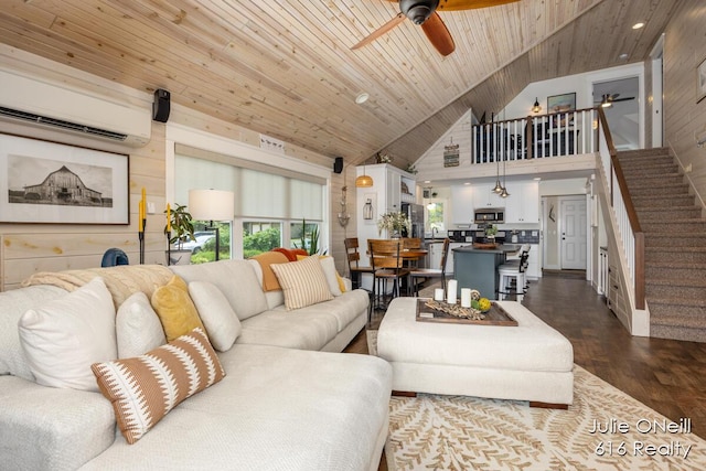 living area with wood ceiling, a wall mounted AC, a ceiling fan, and stairs