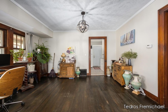 office space with crown molding, a notable chandelier, a textured ceiling, wood finished floors, and visible vents