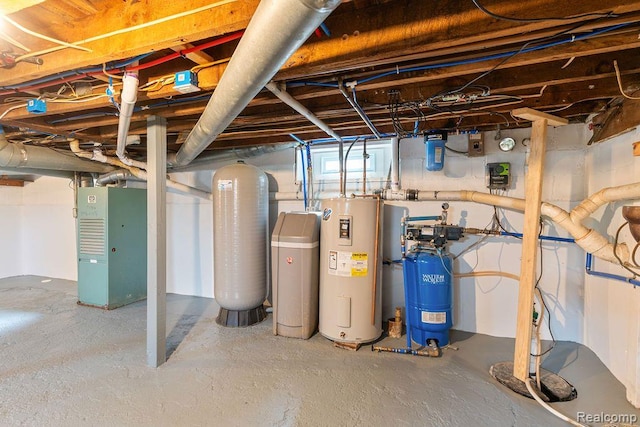 1319 Rochester Rd, Leonard, MI 48367 - basement with electric water heater, a water softener, and heating unit