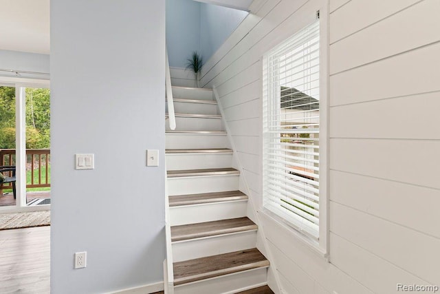 1319 Rochester Rd, Leonard, MI 48367 - stairway with wooden walls
