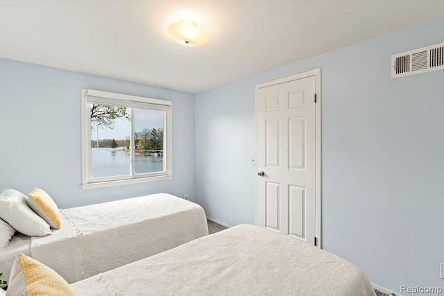 1319 Rochester Rd, Leonard, MI 48367 - carpeted bedroom with baseboards
