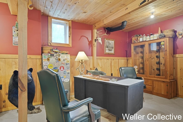 office featuring a wainscoted wall, wooden walls, and wooden ceiling