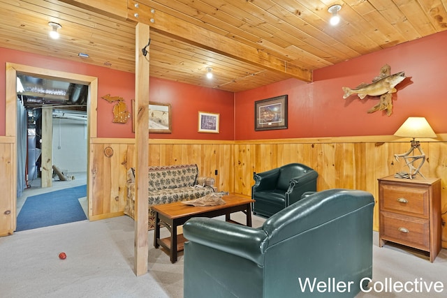 sitting room featuring wainscoting and carpet flooring