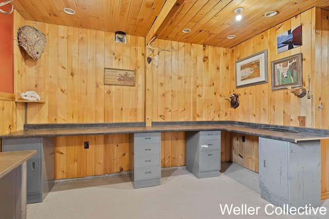 unfurnished office featuring recessed lighting, wooden ceiling, and wood walls