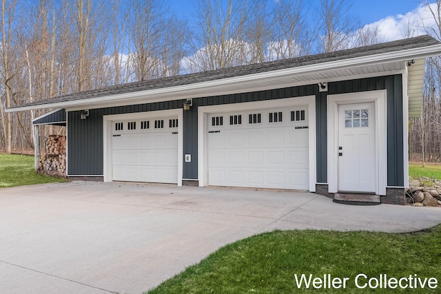 garage featuring driveway
