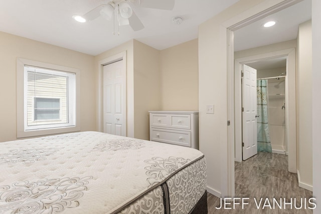 bedroom featuring ceiling fan, recessed lighting, baseboards, wood finished floors, and a closet