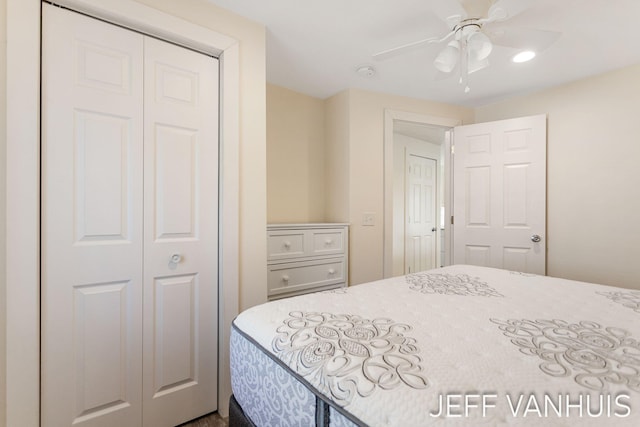 bedroom featuring a closet and a ceiling fan
