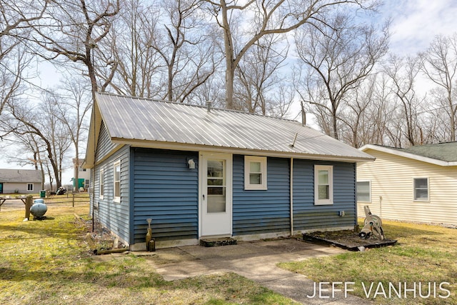 exterior space with metal roof