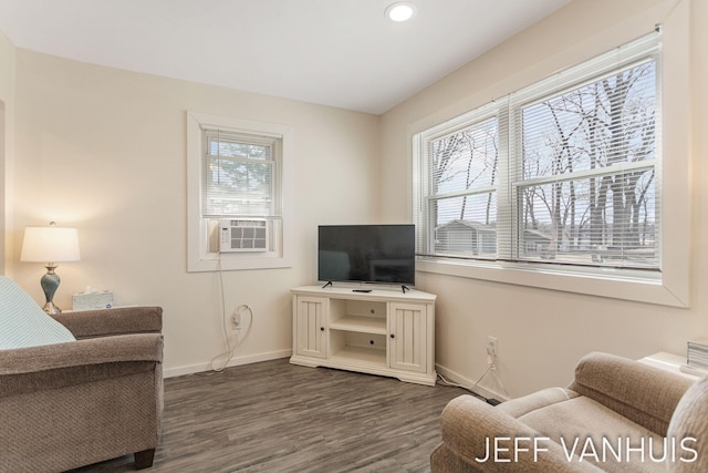living room featuring baseboards, recessed lighting, dark wood-type flooring, and cooling unit