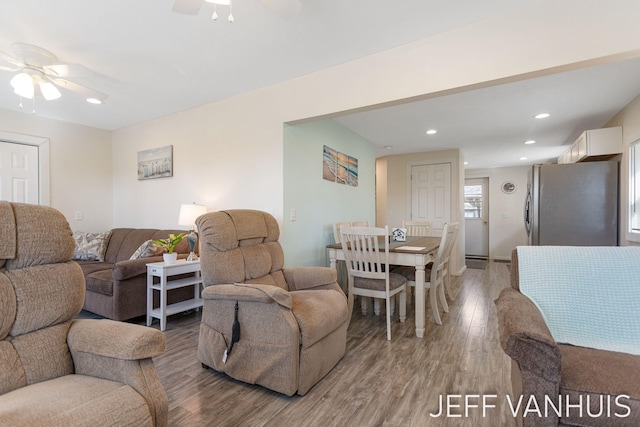living area featuring recessed lighting, ceiling fan, and light wood-type flooring