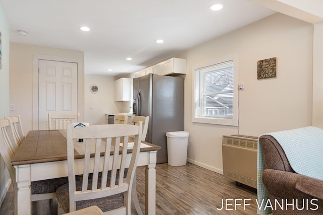 dining area with baseboards, recessed lighting, and wood finished floors
