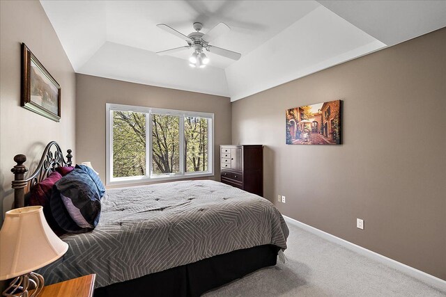 bedroom featuring baseboards, carpet, a ceiling fan, and lofted ceiling