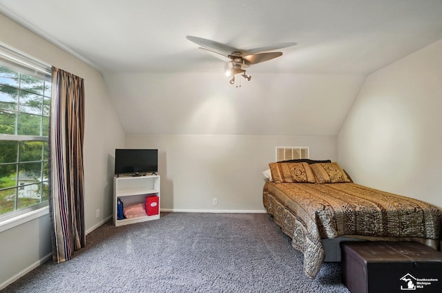 3325 Saint Anthony Rd, Temperance, MI 48182 - carpeted bedroom with vaulted ceiling, baseboards, and ceiling fan