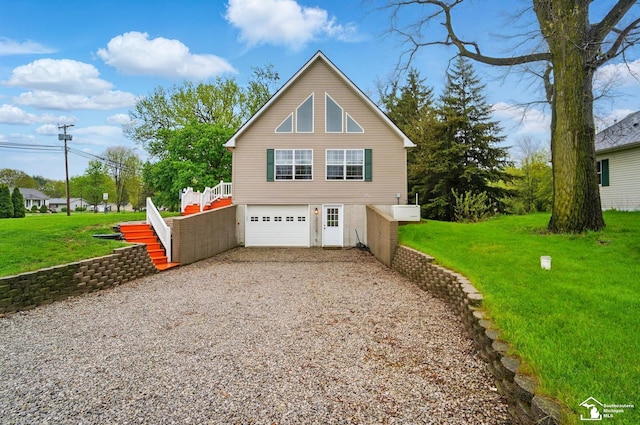 3325 Saint Anthony Rd, Temperance, MI 48182 - view of side of property featuring gravel driveway, a garage, and a lawn