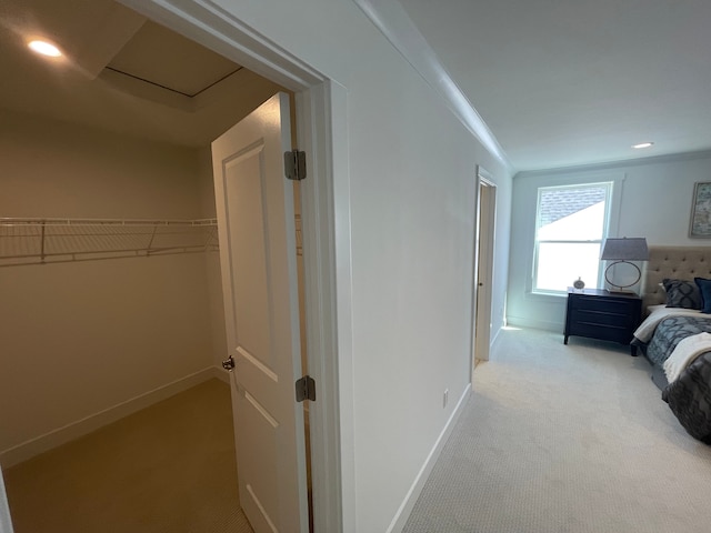 bedroom featuring recessed lighting, baseboards, and light colored carpet