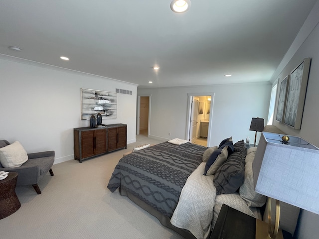 bedroom featuring visible vents, baseboards, ensuite bathroom, recessed lighting, and light colored carpet