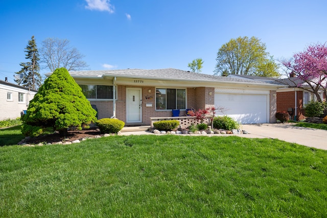 ranch-style house featuring brick siding, an attached garage, driveway, and a front lawn