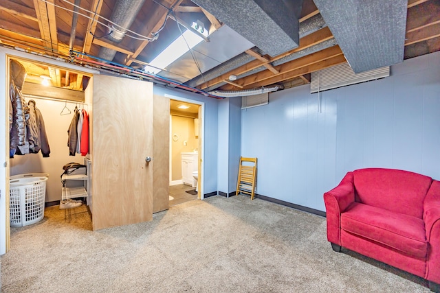finished below grade area featuring carpet floors and baseboards