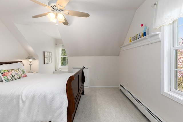 bedroom with a ceiling fan, light colored carpet, baseboard heating, baseboards, and lofted ceiling
