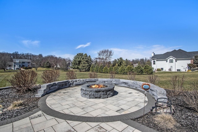 46140 Finch St, Mattawan, MI 49071 - view of patio / terrace with an outdoor fire pit