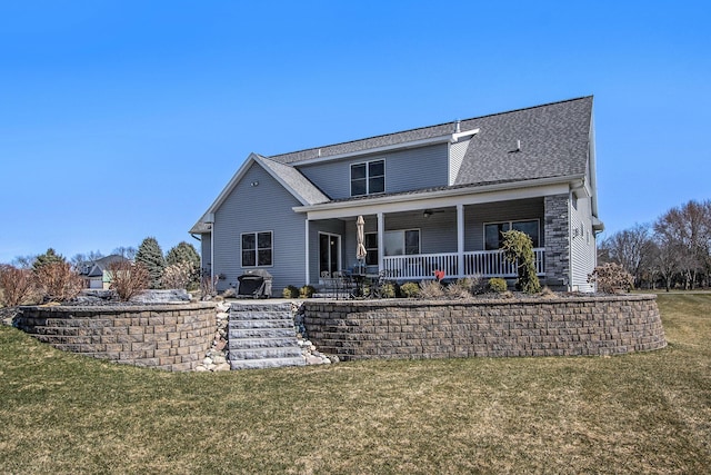 46140 Finch St, Mattawan, MI 49071 - back of property with a lawn, stairs, a shingled roof, and a porch