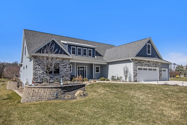 46140 Finch St, Mattawan, MI 49071 - craftsman-style house featuring a front yard, driveway, a shingled roof, and stone siding
