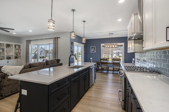 46140 Finch St, Mattawan, MI 49071 - kitchen with open floor plan, appliances with stainless steel finishes, a wealth of natural light, and a sink