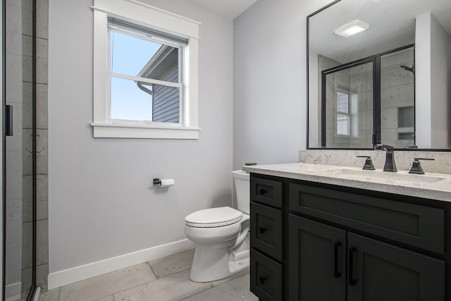46140 Finch St, Mattawan, MI 49071 - bathroom with vanity, baseboards, a shower stall, and toilet