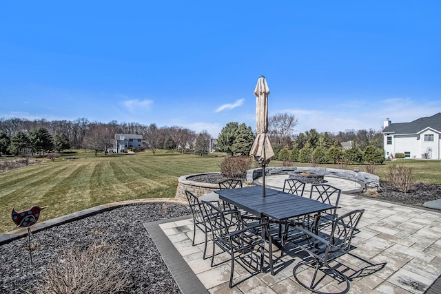 46140 Finch St, Mattawan, MI 49071 - view of patio / terrace with outdoor dining area and an outdoor fire pit