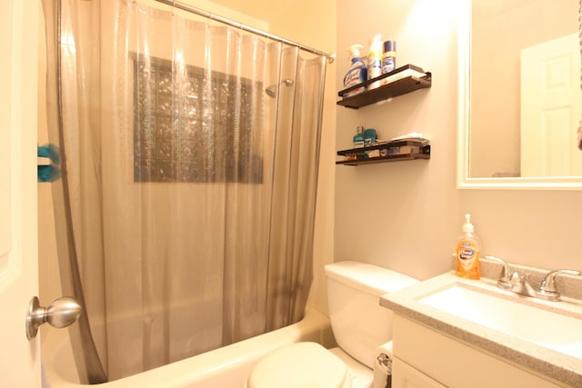 bathroom with toilet, shower / bath combination with curtain, and vanity