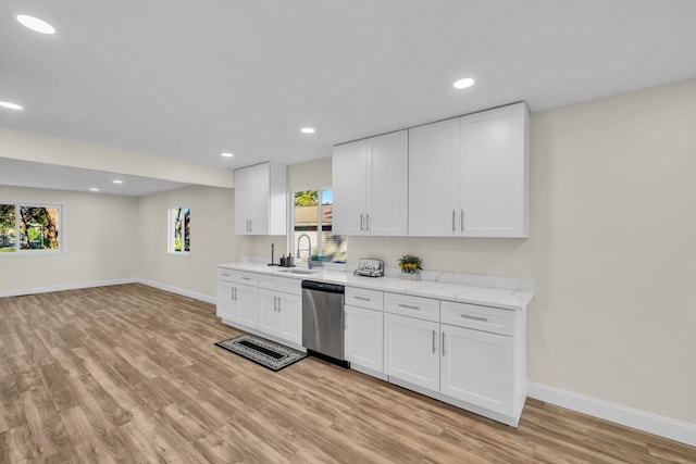 37451 Carpathia Blvd, Sterling Heights, MI 48310 - kitchen with baseboards, a sink, light wood-style floors, and dishwasher