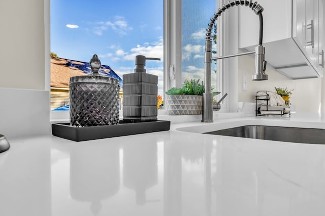 37451 Carpathia Blvd, Sterling Heights, MI 48310 - details featuring a sink and light countertops