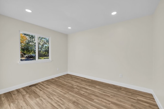 37451 Carpathia Blvd, Sterling Heights, MI 48310 - spare room featuring visible vents, recessed lighting, light wood finished floors, and baseboards