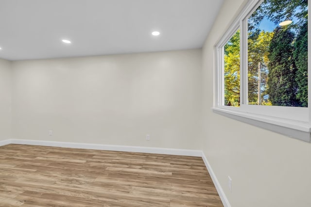 37451 Carpathia Blvd, Sterling Heights, MI 48310 - empty room with baseboards, recessed lighting, and light wood-style flooring