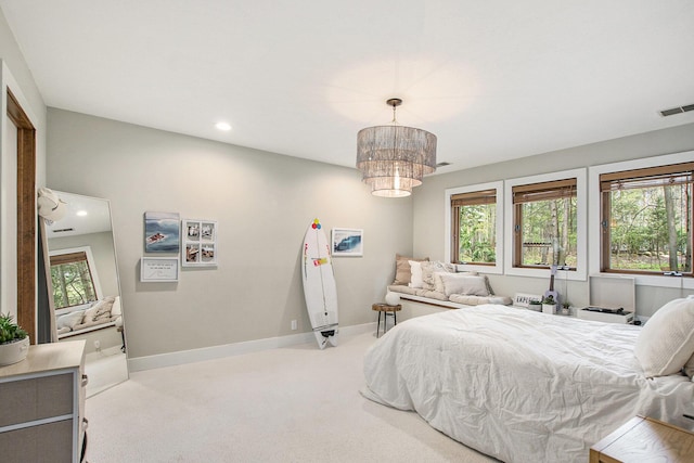 bedroom featuring visible vents, recessed lighting, baseboards, and light colored carpet
