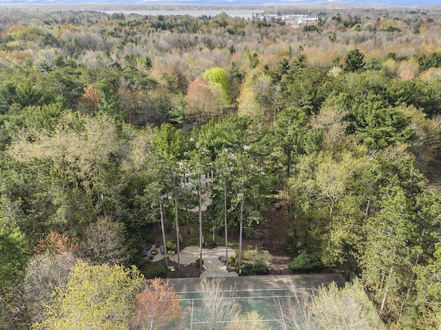 birds eye view of property with a forest view