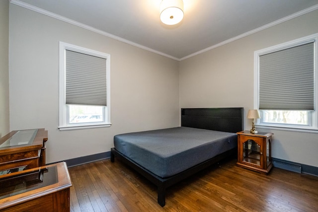 bedroom featuring crown molding, baseboards, visible vents, and dark wood-type flooring