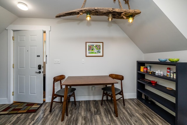 office space featuring lofted ceiling and dark wood-type flooring