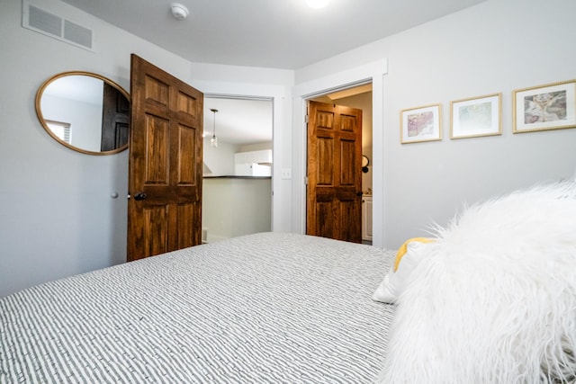 bedroom with visible vents