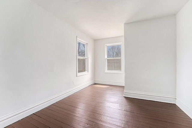 10145 W Kl Ave, Kalamazoo, MI 49009 - unfurnished room featuring dark wood-type flooring and baseboards