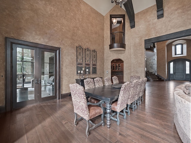 26565 Scenic, Franklin, MI 48025 - dining space featuring french doors, plenty of natural light, hardwood / wood-style floors, and high vaulted ceiling