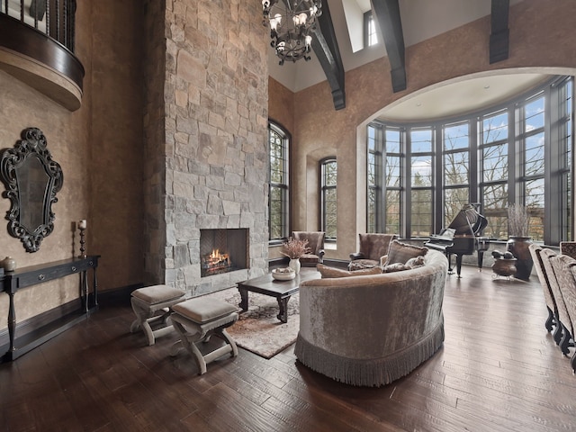 26565 Scenic, Franklin, MI 48025 - living area featuring a fireplace, a high ceiling, and hardwood / wood-style floors