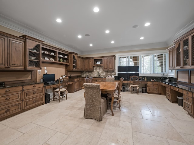 26565 Scenic, Franklin, MI 48025 - dining space featuring built in study area, crown molding, recessed lighting, and stone tile flooring