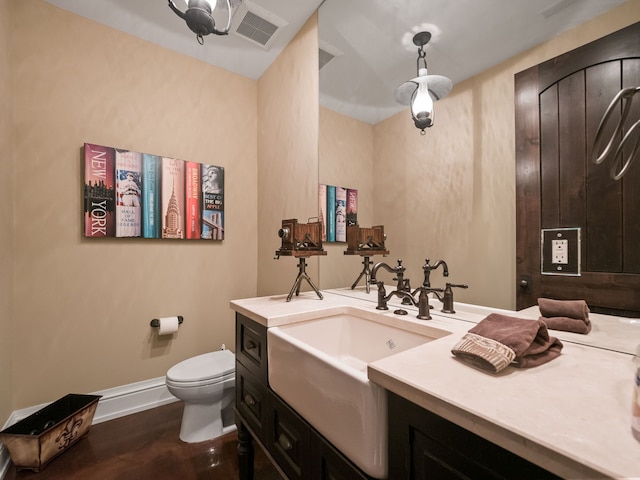 26565 Scenic, Franklin, MI 48025 - half bath with baseboards, vanity, toilet, and visible vents