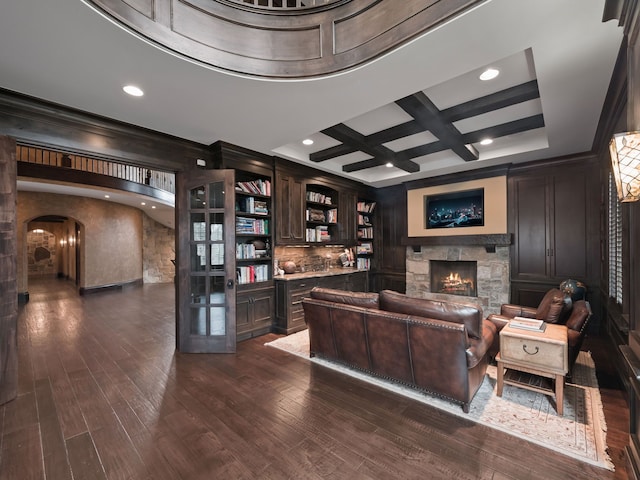 26565 Scenic, Franklin, MI 48025 - living area with ornamental molding, a fireplace, dark wood-type flooring, arched walkways, and coffered ceiling