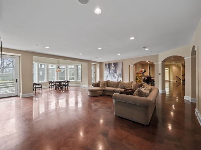 26565 Scenic, Franklin, MI 48025 - living area featuring ornate columns, arched walkways, recessed lighting, and baseboards
