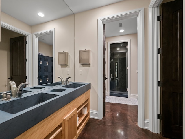 26565 Scenic, Franklin, MI 48025 - bathroom with a sink, baseboards, and finished concrete flooring