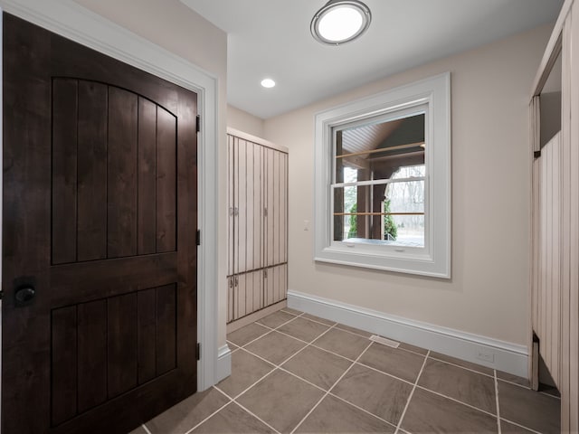 26565 Scenic, Franklin, MI 48025 - foyer entrance featuring baseboards, tile patterned floors, and visible vents